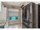 This kitchen features modern appliances, granite counters and tile flooring at 19375 Water Oak Dr # 106, Port Charlotte, FL 33948