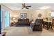 Open-concept living room flows into dining area and kitchen, creating an inviting space at 19375 Water Oak Dr # 106, Port Charlotte, FL 33948