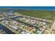 Sweeping aerial of a waterfront community featuring homes, canals, and verdant landscapes at 211 Lido Dr, Punta Gorda, FL 33950