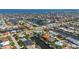 Panoramic aerial of waterfront homes with private docks and canals leading to the open water at 211 Lido Dr, Punta Gorda, FL 33950