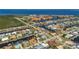 Wide aerial view of canals that weave through a neighborhood of homes, a waterfront paradise at 211 Lido Dr, Punta Gorda, FL 33950