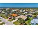 Beautiful waterfront homes line canals with boat docks and tropical landscaping, coastal living at its finest at 211 Lido Dr, Punta Gorda, FL 33950