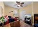 Bedroom features a ceiling fan, window, closet and stylish colorful decor and furnishings at 211 Lido Dr, Punta Gorda, FL 33950