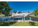 Canal-front home featuring a private boat lift, providing easy access to the water at 211 Lido Dr, Punta Gorda, FL 33950
