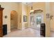 Bright foyer with tile flooring and decorative accents that create a welcoming atmosphere at 211 Lido Dr, Punta Gorda, FL 33950