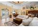Cozy living room with decorative rug, high ceilings and view of the kitchen and dining area at 211 Lido Dr, Punta Gorda, FL 33950