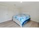 This bright bedroom boasts a large closet and a window, creating a comfortable and inviting retreat at 22010 Seyburn Ter, Port Charlotte, FL 33954