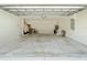 Clean garage featuring an open layout, bright lighting, and space for parking and storage at 22010 Seyburn Ter, Port Charlotte, FL 33954