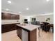 Open-concept kitchen island overlooks the living area and dining space, great for entertaining and Gathering gatherings at 22010 Seyburn Ter, Port Charlotte, FL 33954