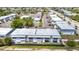 Upper aerial view of building with parking and landscaping, conveniently located near neighborhood businesses and shopping at 22375 Edgewater Dr # 255, Punta Gorda, FL 33980