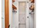 This bathroom features an adjacent walk-in closet with plenty of shelf storage and an enclosed toilet area at 22375 Edgewater Dr # 255, Punta Gorda, FL 33980