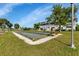 Bocce ball court for residents' enjoyment with seating and manicured landscaping at 22375 Edgewater Dr # 255, Punta Gorda, FL 33980