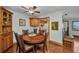 Dining area featuring hardwood floors, wooden table and chairs, and wood accents at 22375 Edgewater Dr # 255, Punta Gorda, FL 33980