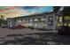 Condo building with ample parking spaces, exterior stairs and upper and lower units at 22375 Edgewater Dr # 255, Punta Gorda, FL 33980
