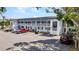 Exterior view of well-maintained building; each unit features its own private balcony and nearby parking at 22375 Edgewater Dr # 255, Punta Gorda, FL 33980