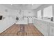 Community laundry room featuring multiple washers and dryers with large folding table at 22375 Edgewater Dr # 255, Punta Gorda, FL 33980