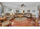 Inviting living room with hardwood floors, comfortable seating and bright light at 22375 Edgewater Dr # 255, Punta Gorda, FL 33980