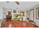 Cozy living room and entryway features hardwood floors and an open floor plan at 22375 Edgewater Dr # 255, Punta Gorda, FL 33980