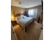 Comfortable bedroom featuring a bed and natural lighting at 2306 Lee Ter, Port Charlotte, FL 33952