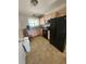 Functional kitchen with essential appliances at 2306 Lee Ter, Port Charlotte, FL 33952