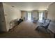 Bright and airy living room with sliding doors to the backyard at 2306 Lee Ter, Port Charlotte, FL 33952