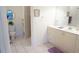 Bright bathroom with toilet, shower, and vanity, offering a refreshing and functional space at 24141 Green Heron Dr # 23, Punta Gorda, FL 33980