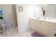 Bright bathroom with toilet, shower, and vanity, offering a refreshing and functional space at 24141 Green Heron Dr # 23, Punta Gorda, FL 33980