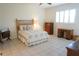 Inviting bedroom with natural light, tile flooring, and a cozy decor at 24141 Green Heron Dr # 23, Punta Gorda, FL 33980
