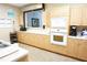 Functional kitchen featuring ample counter space, modern appliances, and pass-through window to another area at 24141 Green Heron Dr # 23, Punta Gorda, FL 33980