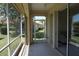 Enclosed patio provides serene views of the backyard; a perfect space for relaxation at 24141 Green Heron Dr # 23, Punta Gorda, FL 33980