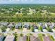 Aerial view of the home and yard shows its location in a well-kept residential neighborhood at 2427 Carnation Ct, North Port, FL 34289