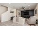 Comfortable living room with stylish furnishings and a large area rug at 2427 Carnation Ct, North Port, FL 34289