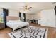 Well-lit main bedroom with an adjacent office space and sleek, modern design at 2427 Carnation Ct, North Port, FL 34289