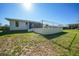 Image of the backyard featuring a partial inground swimming pool and fenced yard at 2621 Larkspur Dr, Punta Gorda, FL 33950