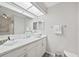 Bright bathroom showcases modern vanity, vessel sink, and overhead lighting at 2621 Larkspur Dr, Punta Gorda, FL 33950