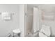 Well-lit bathroom shows accessibility features and clean design aesthetic at 2621 Larkspur Dr, Punta Gorda, FL 33950