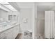 Updated bathroom with accessible shower, grab bars, and sleek design at 2621 Larkspur Dr, Punta Gorda, FL 33950