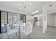 Modern kitchen boasts stainless steel appliances, sleek white cabinets, and ample natural light at 2621 Larkspur Dr, Punta Gorda, FL 33950