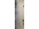 Bathroom with a shower and shower curtain, along with tiled walls at 26456 View Dr, Punta Gorda, FL 33983