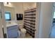 Well-lit bathroom featuring a sink, toilet, and a shower with a stylish striped curtain at 26456 View Dr, Punta Gorda, FL 33983