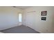 Bedroom with a bed and closet with neutral colors throughout at 26456 View Dr, Punta Gorda, FL 33983