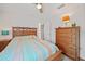 Cozy bedroom featuring a comfortable bed, stylish furnishings, and neutral décor at 2666 Barry Rd, North Port, FL 34286