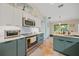 Well-appointed kitchen with stainless steel appliances, granite countertops, and ample cabinet space at 2666 Barry Rd, North Port, FL 34286