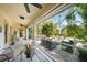 Large screened in patio and an outdoor sitting area at 2666 Barry Rd, North Port, FL 34286