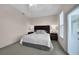 Comfortable bedroom offers plush carpet and ample natural light from large windows at 3513 Dileuca St, Punta Gorda, FL 33950