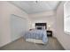 Cozy bedroom boasts a tray ceiling and & nightstands at 3513 Dileuca St, Punta Gorda, FL 33950