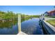 The canal behind the property offers a boat lift with clear views of the water and mangrove shoreline at 3513 Dileuca St, Punta Gorda, FL 33950