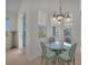 Dining area with decorative lighting and windows providing natural light at 3513 Dileuca St, Punta Gorda, FL 33950