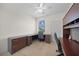 Home office featuring desk with cabinets, tile floors, a ceiling fan, and natural light at 3513 Dileuca St, Punta Gorda, FL 33950