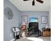 Calming bedroom with a ceiling fan and artwork, illuminated by natural light at 3520 Kenneth Rd, Port Charlotte, FL 33953